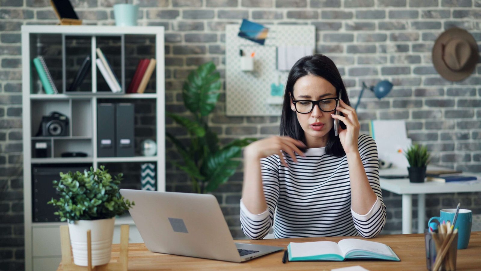 Accountant compiling monthly management accounts for a small business