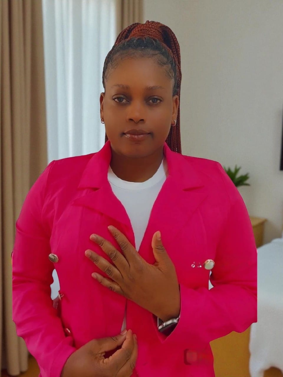 Prisca Accountant at Biz Evolution, smiling in professional attire